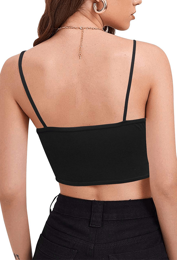 Woman wearing black spaghetti strap square-neck crop top near tree